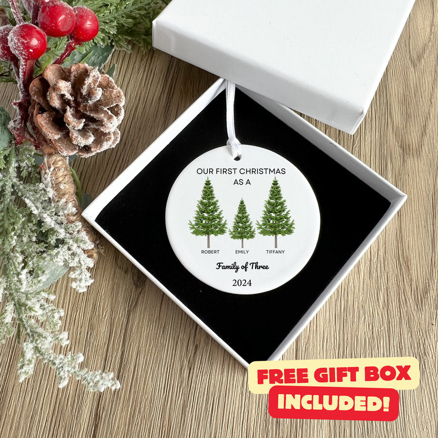 a christmas tree ornament in a gift box